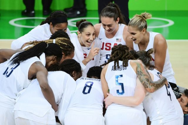 USA's guard Diana Taurasi (C) celebrates winning the women's gold medal basketball match i