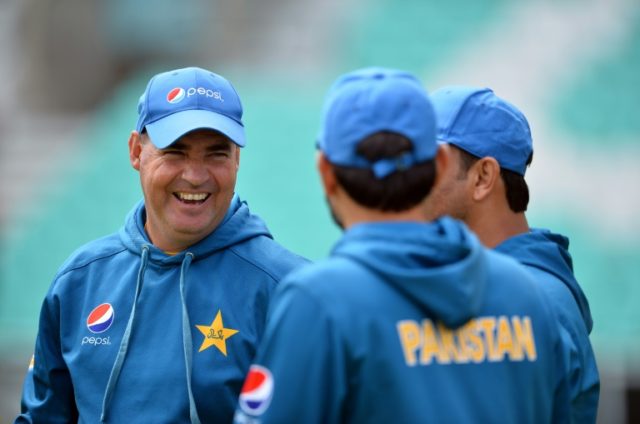 Pakistan's head coach Mickey Arthur (L), seen during a team training session at the Oval c