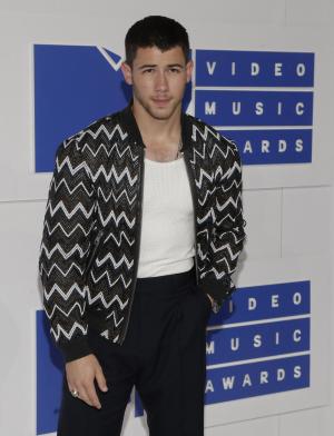Nick Jonas supports Joe Jonas at 2016 MTV VMAs