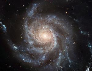Scientists discover how disk galaxies form spiral arms