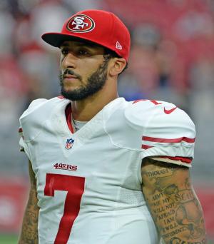 49ers QB Colin Kaepernick sits in protest during national anthem