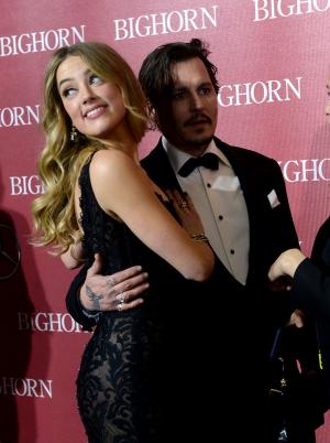 Amber Heard delays deposition in Johnny Depp case