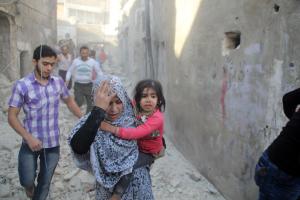Barrel bombs dropped on Aleppo funeral wake for children