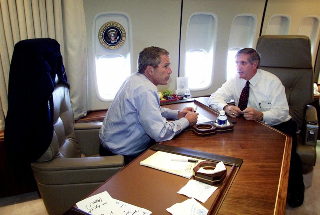 President Bush talks with Chief of Staff Andrew Card aboard Air Force One during a flight to Offutt Air Force Base in Omaha, Neb., following the presidents' statement about the terrorist attack on the World Trade Center in New York City, Tuesday, Sept. 11, 2001. (AP Photo/Doug Mills)