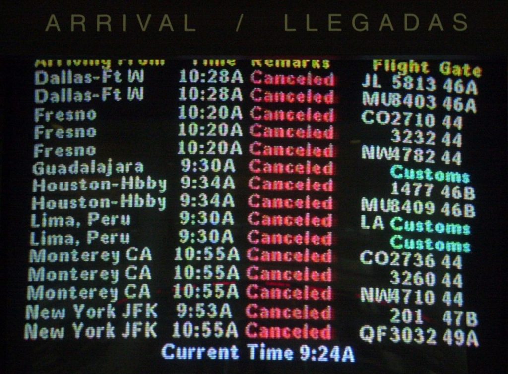 A sreen at the American Airlines terminal at Los Angeles Internatinal Airport shows that all flights have been canceled as the airport is shutdown, Tuesday, Sept. 11, 2001. In one of the most horrifying attacks ever against the United States, terrorists crashed two airliners into the World Trade Center in a deadly series of blows that brought down the twin 110-story towers. A plane also slammed into the Pentagon as the government itself came under attack. (AP Photo/Nick Ut)