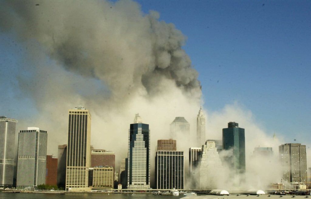 This is a view of the Manhattan skyline from Brooklyn, Tuesday, Sept. 11, 2001, after the World Trade Center towers collapsed following being struck by airplanes. (AP Photo/Kathy Willens)