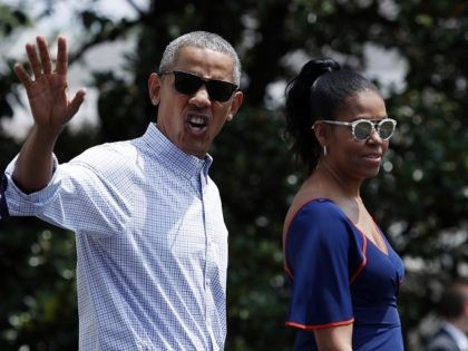 President Barack Obama waves and calls out to media as he and first lady Michelle Obama walk from the White House, Saturday, Aug. 6, 2016, in Washington, to board Marine One, with their daughters Sasha and Malia, en route to Andrews Air Force Base, Md., and on to Martha's Vineyard …
