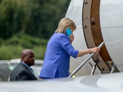 Democratic presidential candidate Hillary Clinton boards her plane at the Cincinnati Municipal Lunken Airport in Cincinnati, Ohio, Wednesday, Aug. 31, 2016, after speaking at the American Legion's 98th Annual Convention. (AP Photo/Andrew Harnik)