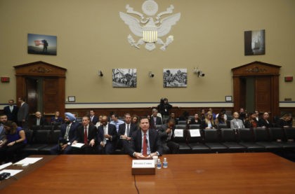 FBI Director James Comey prepares to testify on Capitol Hill in Washington, Wednesday, Sep