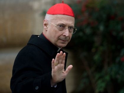 Italian cardinal Angelo Bagnasco arrives for a meeting on the eve of the start of a conclave on March 11, 2013 at the Vatican. Cardinals will hold a final set of meetings on Monday before they are locked away to choose a new pope to lead the Roman Catholic Church …