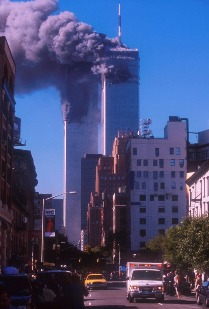 394273 03: Smoke billows from the World Trade Center's twin towers after they were struck by commerical airliners in a suspected terrorist attack September 11, 2001 in New York City. (Photo by Ezra Shaw/Getty Images)