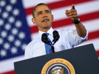 Barack Obama speaks on raising the national minimum wage at the University of Michigan on