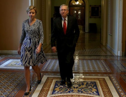 WASHINGTON, DC - SEPTEMBER 30: Senate Majority Leader Mitch McConnell (R-KY) walks with an aide as he leaves the Senate Chamber after a vote to avert a government shutdown, on Capitol Hill September 30, 2015 in Washington, DC. The Senate voted in favor of a funding bill that would avert …