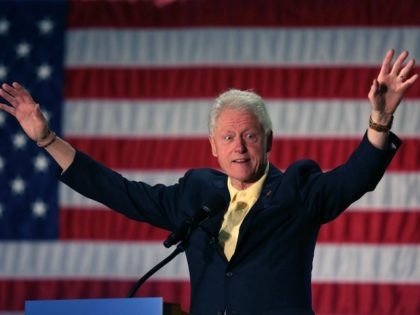 Former President Bill Clinton campaigns for his wife, Democratic presidential candidate Hi