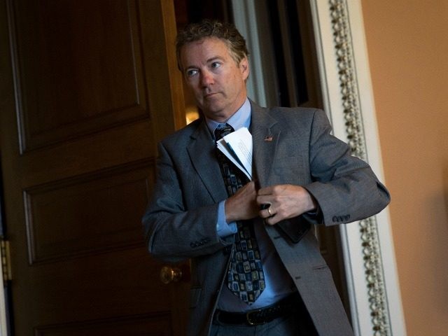 Sen. Rand Paul (R-KY) emerges from a closed-door weekly policy meeting with Senate Republicans, at the U.S. Capitol, May 10, 2016, in Washington, DC.