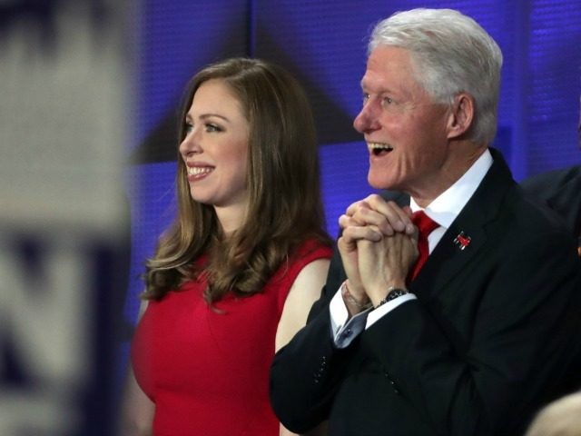 Chelsea Clinton and father, former US President Bill Clinton seen at the end of the fourth day of the Democratic National Convention at the Wells Fargo Center, July 28, 2016 in Philadelphia, Pa.