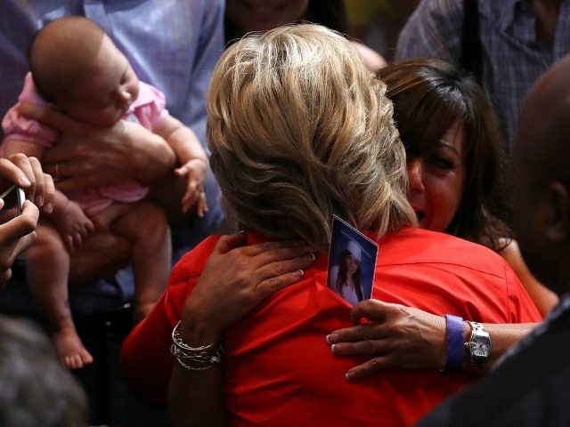 Democratic presidential nominee former Secretary of State Hillary Clinton hugs a supporter