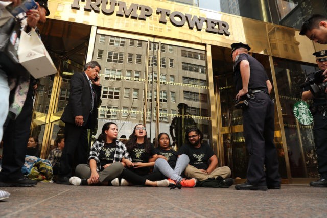 NEW YORK, NY - AUGUST 31: Protesters block the entrance to Trump Tower in Manhattan befor