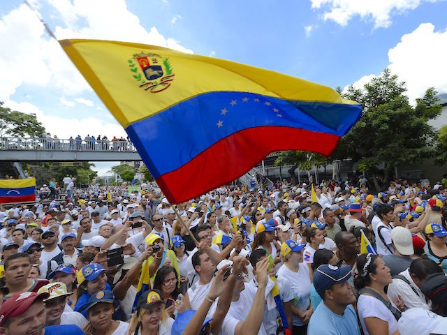 Opposition activists attend a rally in Caracas, on September 1, 2016. Venezuela's opp