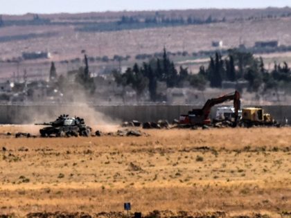 This picture taken on September 4, 2016 at Elbeyli, in the southern region of Kilis, shows Turkish tank coming from Syria during clashes betweenTurkish army and ISIS militants. Ankara stepped up its fight against militants in Turkey and northern Syria with air strikes on Kurdish rebel positions in the restive …