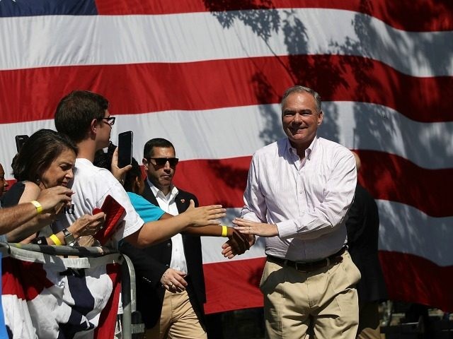 Democratic vice presidential nominee Tim Kaine greets supporters during a campaign rally with Democratic presidential nominee former Secretary of State Hillary Clinton at Luke Easter Park on September 5, 2016 in Cleveland, Ohio.