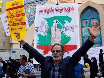 An Iranian man participates in an anti-Saudi demonstration in the capital Tehran on Septem