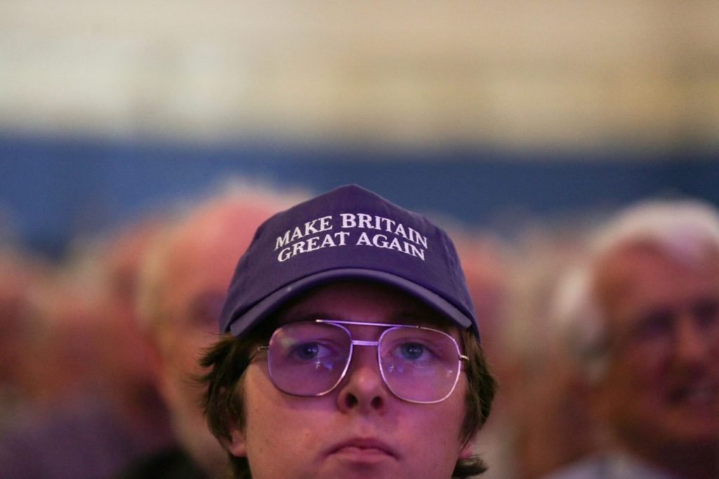 TOPSHOT - A supporter of the anti-EU UK Independence Party (UKIP) looks on at the UKIP Autumn Conference in Bournemouth, on the southern coast of England, on September 16, 2016. Britain's UKIP announces its new leader on September 16, though the contest to replace charismatic figurehead Nigel Farage has divided the anti-EU party. Farage made the shock decision to quit as leader of the UK Independence Party following victory in the referendum on Britain's membership of the European Union. / AFP / Daniel Leal-Olivas (Photo credit should read DANIEL LEAL-OLIVAS/AFP/Getty Images)
