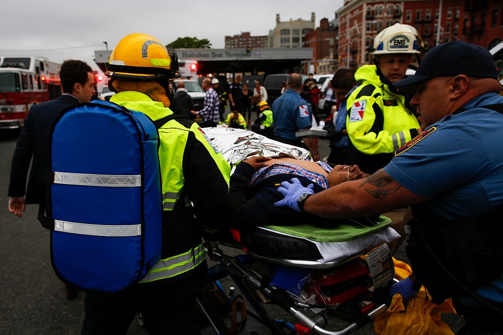 NEW YORK, NY - SEPTEMBER 29: People are treated for their injuries outside after a NJ Transit train crashed in to the platform at Hoboken Terminal September 29, 2016 in Hoboken, New Jersey. Dozens are reported injured from the rush hour accident in the terminal that handles up to 50,000 passengers a day. (Photo by Eduardo Munoz Alvarez/Getty Images)