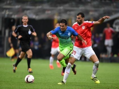 MILAN, ITALY - SEPTEMBER 15: (L-R) Citadin Eder of FC Internazionale competes for the ball