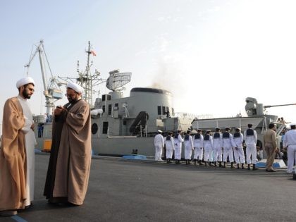 Iranian clerics standing in front of the "Jamran", Iran's first domestically built warship, during naval maneuvers in the Gulf on February 21, 2009. Iran's navy on February 19 launched in the Gulf its first domestically made destroyer in a ceremony attend by the supreme leader and the commander-in-chief Ayatollah Ali …