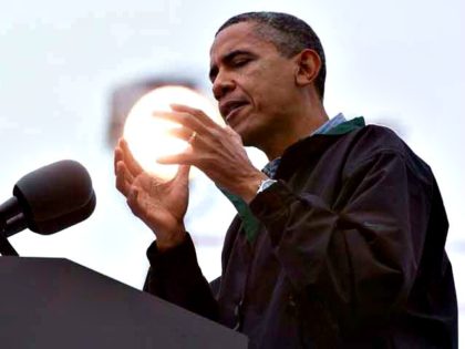 Obama Holds Mysterious Globe AP