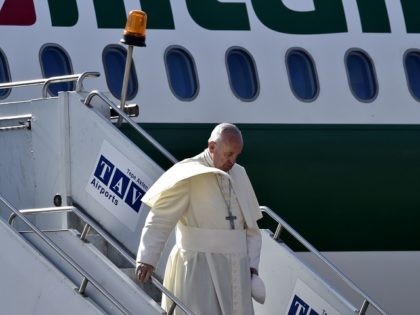 Pope Francis disembarks from a plane after arriving at Tbilisi International Airport on Se