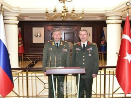 Turkey's Chief of Staff Gen. Hulusi Akar, right, and his Russian counterpart Gen. Valery G