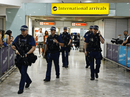 Armed UK police Heathrow Airport