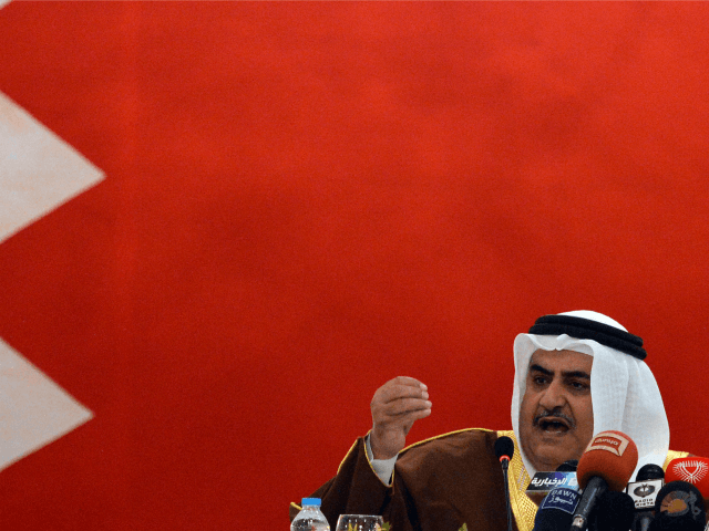 Bahraini Foreign Minister Sheikh Khaled bin Ahmed al-Khalifa speaks with media representat