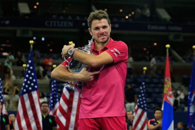 NEW YORK, NY - SEPTEMBER 11: Stan Wawrinka of Switzerland celebrates with the trophy afte