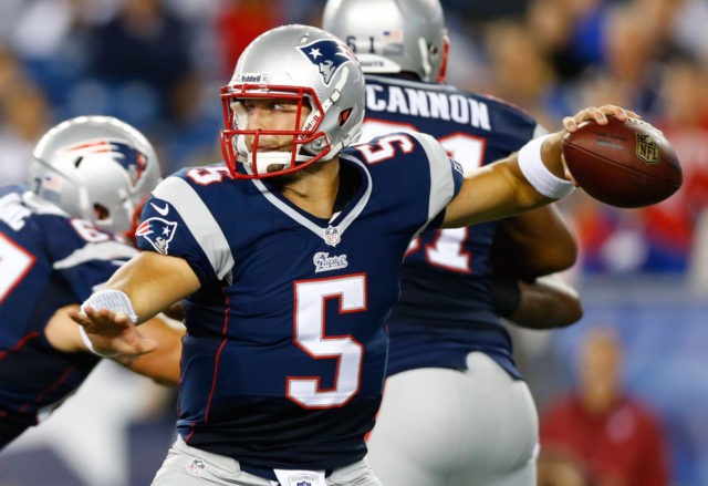 FOXBORO, MA - AUGUST 29: Tim Tebow #5 of the New England Patriots throws a pass against th