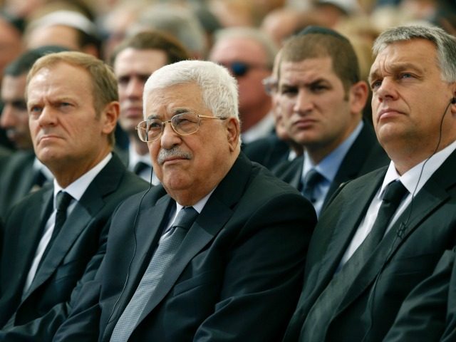 Palestinian president Mahmud Abbas (C) sits alongside European Council President Donald Tu