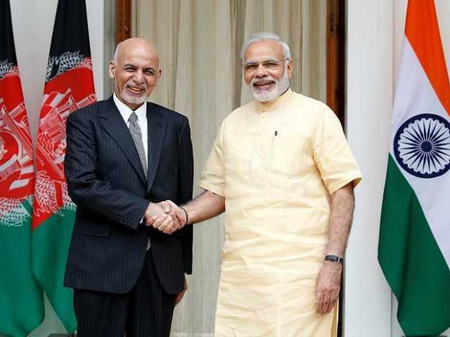 Afghan President Ashraf Ghani (L) and India's Prime Minister Narendra Modi pose for the me