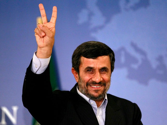 Mahmoud Ahmadinejad gestures as he leaves a news conference in Istanbul, Turkey May 9, 2011. REUTERS/Murad Sezer/File Photo