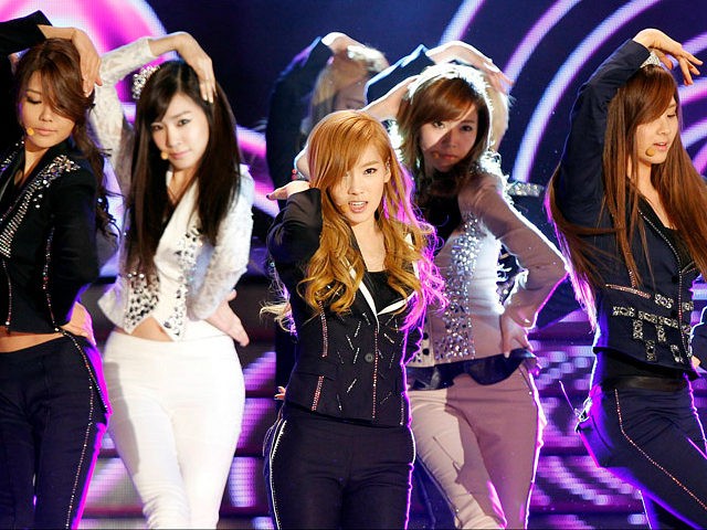 Members of K-Pop idol group Girls' Generation perform during the Korean Pop Culture and Ar