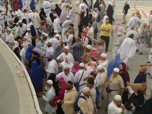 MECCA, SAUDI ARABIA - SEPTEMBER 26: Prospective pilgrims stone the devil as part of the an