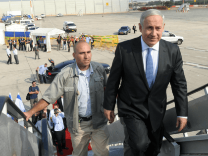 In this handout from the Israeli GPO, Israeli Prime Minister Benjamin Netanyahu walks up t