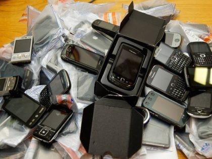 pile of smartphones (West Midlands Police / Flickr / CC Cropped)