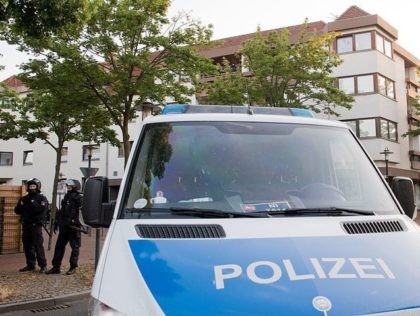 A police car is pictured in front of a mosque on July 27, 2016 in Hildesheim. Police had searched a mosque and houses of eight memebrs of 'German speaking Islamic circle of Hildesheim. / AFP / dpa / Julian Stratenschulte / Germany OUT (Photo credit should read JULIAN STRATENSCHULTE/AFP/Getty Images)