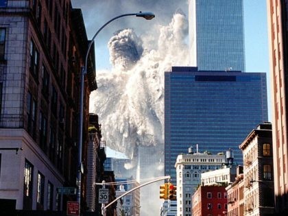 The south tower of the World Trade Center collapses sending dust and smoke into the streets 11 September, 2001, in New York. Two planes crashed into the towers which later collapsed. AFP PHOTO/Aaron MILESTONE (Photo credit should read AARON MILESTONE/AFP/Getty Images)