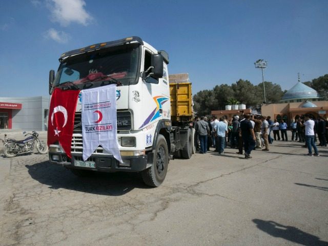 A truck loaded with aid parcels provided by Turkey is parked at the Kerem Shalom crossing