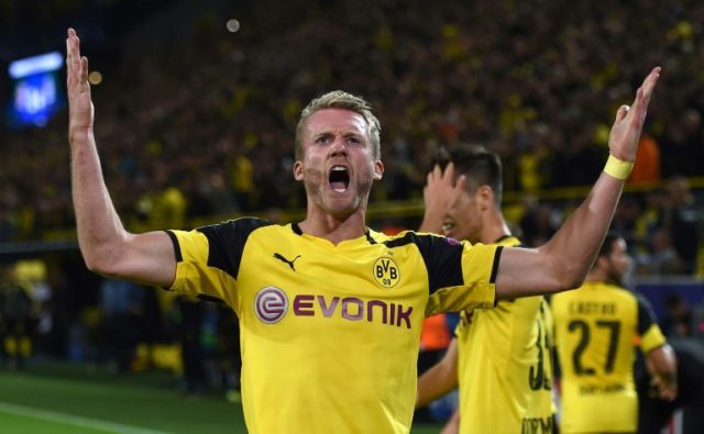 Dortmund's midfielder André Schuerrle celebrates during the UEFA Champions League first l