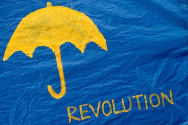 The umbrella, drawn here on a tent in a camp in central Hong Kong in 2014, became a symbol