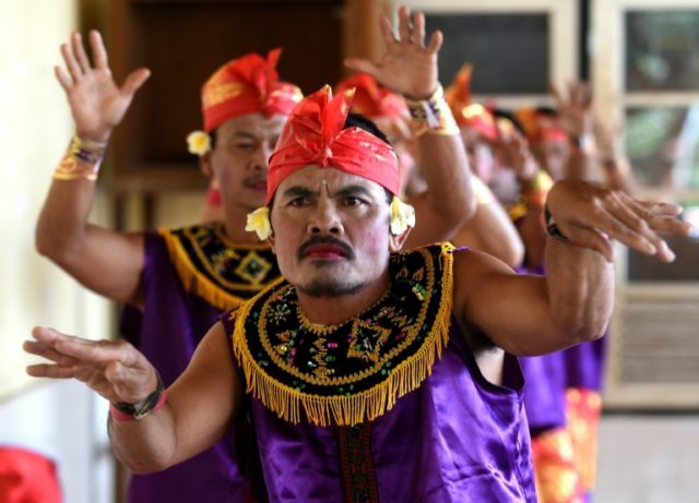 Deaf people perform a traditional dance in the village of Bengkala in Bali